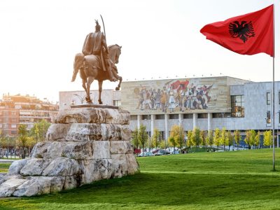 Skanderbeg_square_with_flag_Skanderbeg_monument_and_national_museum_in_the_center_of_Tirana_city_Albania